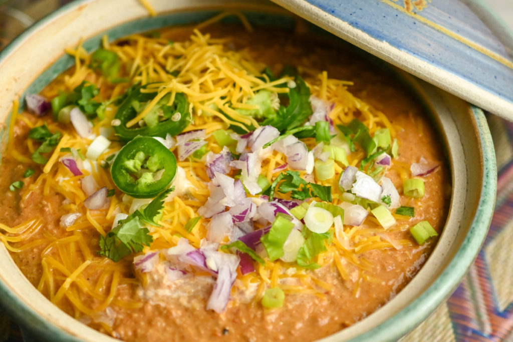 keto chicken chili served in a large teal earthenware