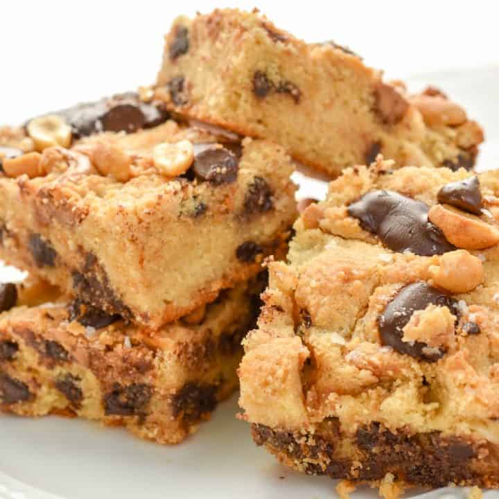These Keto Peanut Butter Chocolate Chip Bars are loaded with peanut butter and chocolate goodness. Thick and oozing with peanut butter and melty sugar-free chocolate chips makes these the perfect little low carb treat.