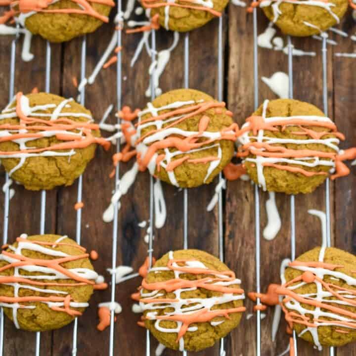 keto cream cheese pumpkin cookies on baking rack glazed