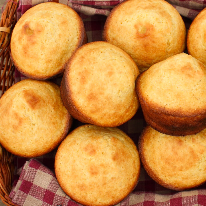 almond flour cornbread muffins in basket with red and white checked napkin