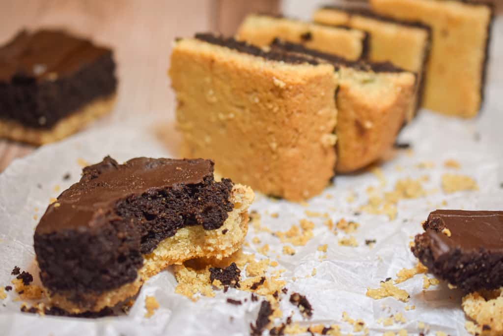keto shortbread brownies with a bite eaten