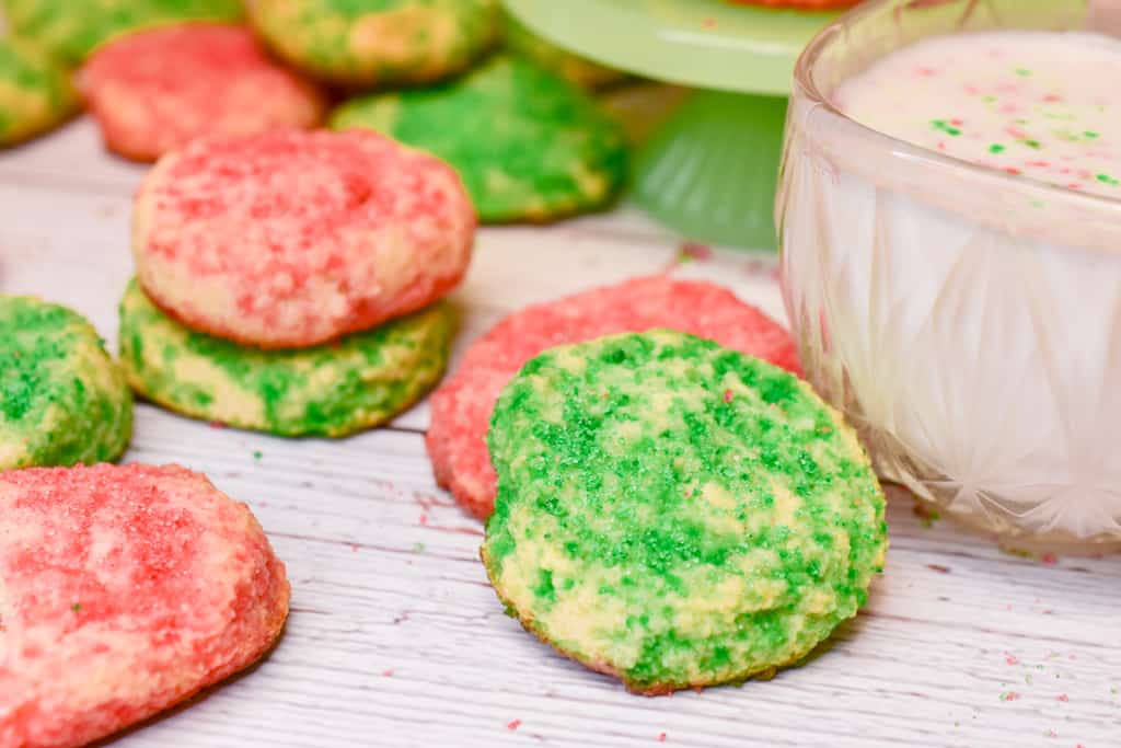 keto soft sugar cookies up close with glass of almond milk