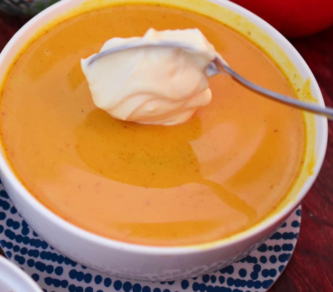 keto carrot soup with a dollop of sour cream
