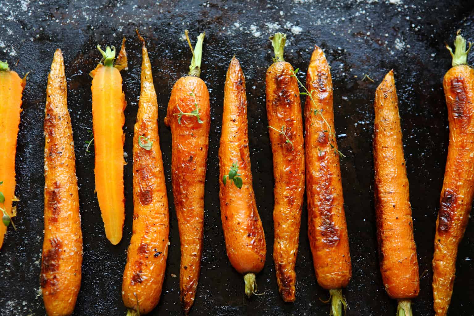 Roasted carrots on a baking sheet