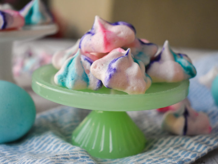 keto french meringues on green pedestal close up