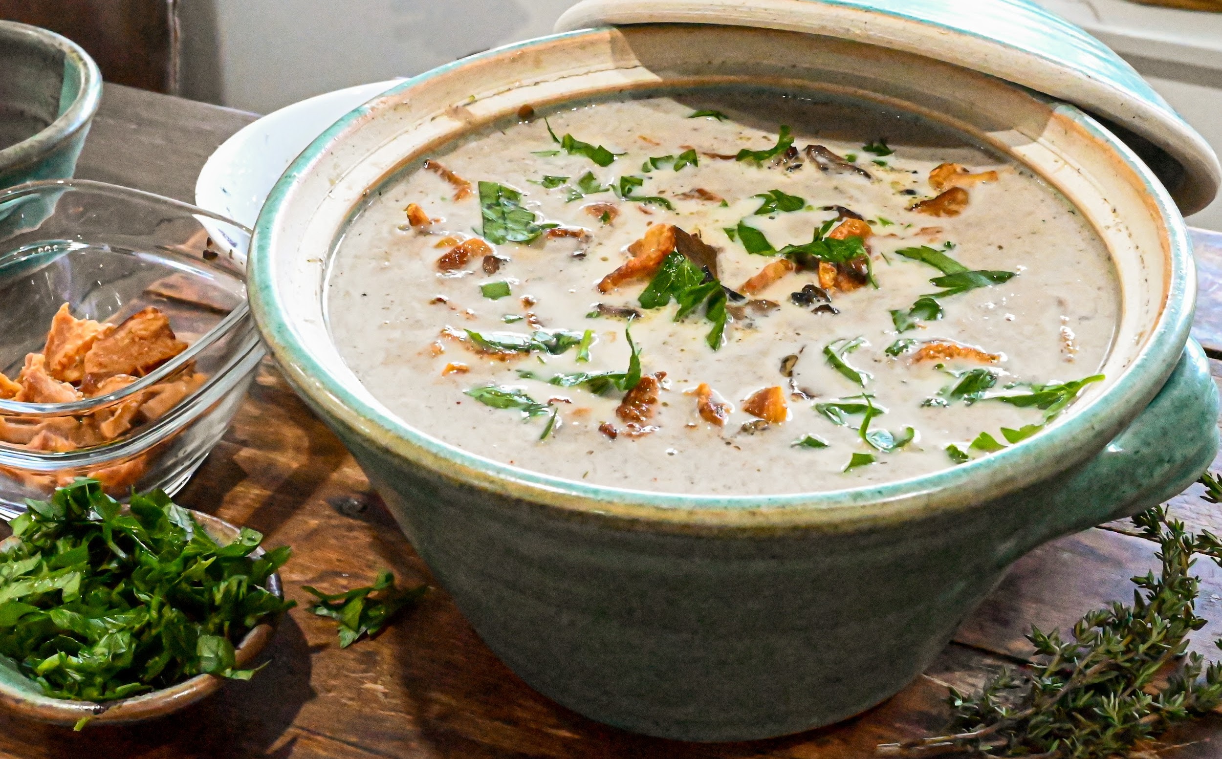 keto mushroom soup in a teal soup tureen ready to serve