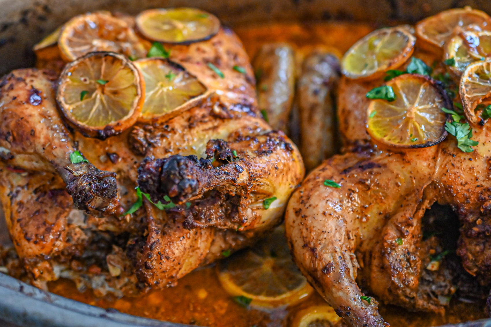 two keto sumac harissa chicken roasted in a large pan