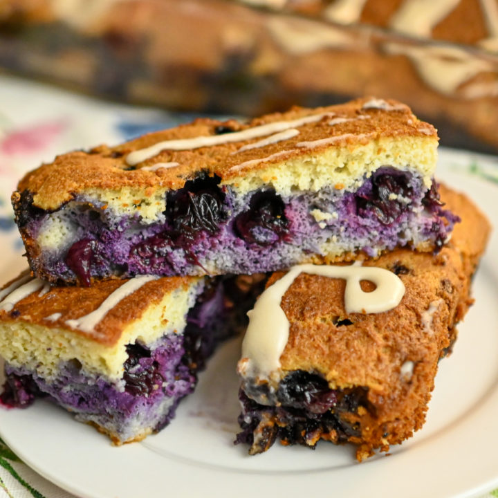 keto blueberry bars on a small white plate