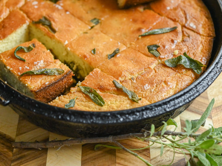 keto brown butter sage cornbread in cast iron slices with sage