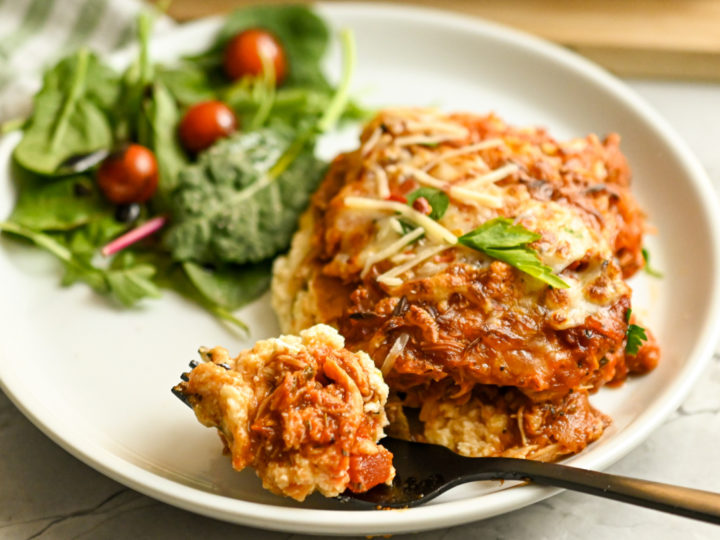 low carb chicken lasagna served with a side salad