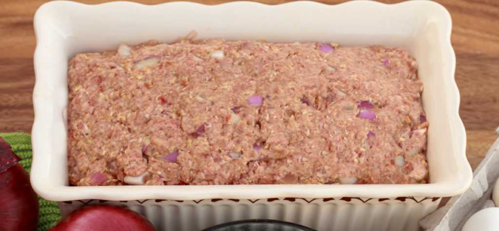 Raw keto meatloaf prepared and ready to bake