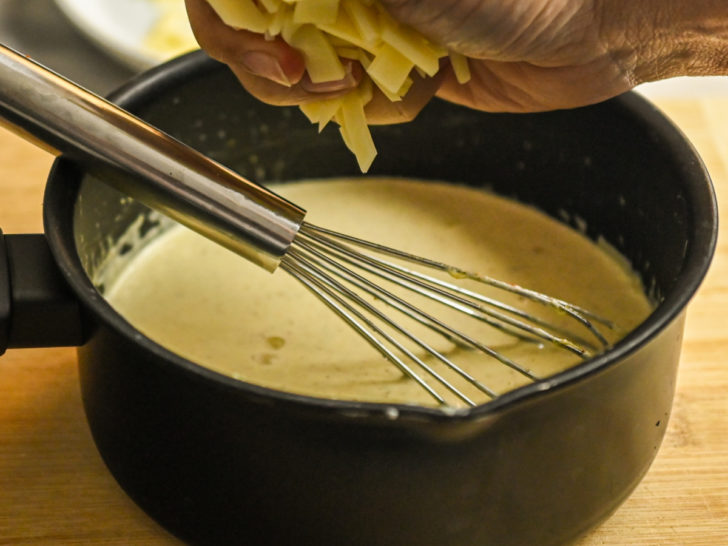 creamy, cheesy Dijon mustard sauce being made