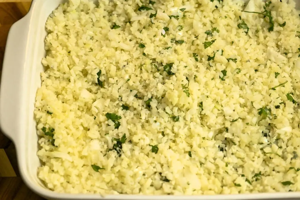 herbed cauliflower rice served a casserole dish