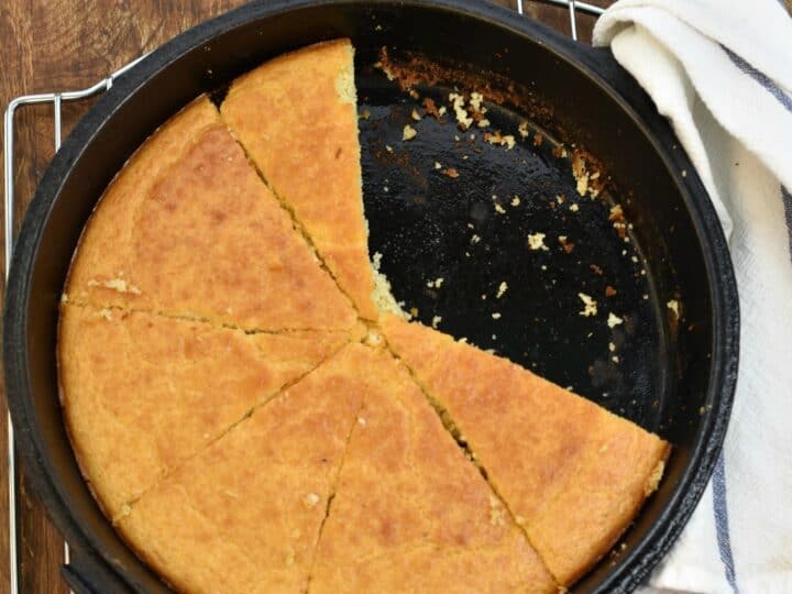 keto cornbread sliced in a cast iron skillet