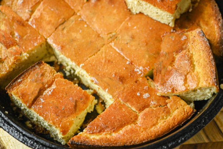 keto-friendly cornbread made with almond meal sliced and ready to serve