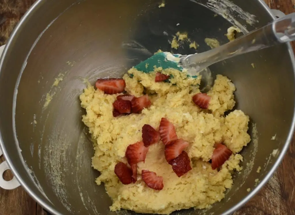 mixing a recipe for keto strawberry scones