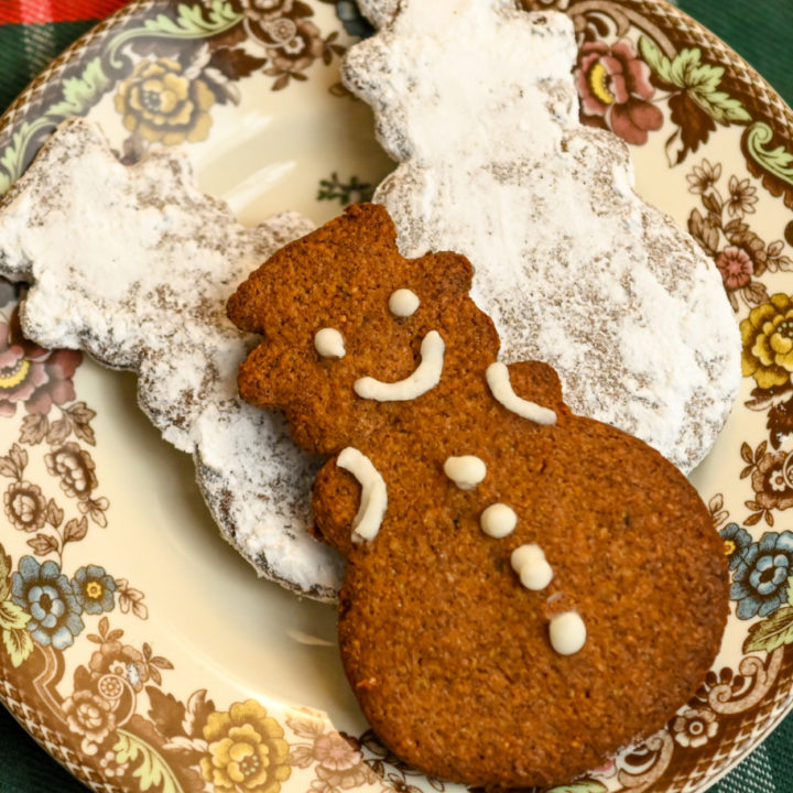 keto gingerbread cookies on a vintage Christmas cookies