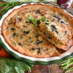 keto quiche baked in a green lined pie dish