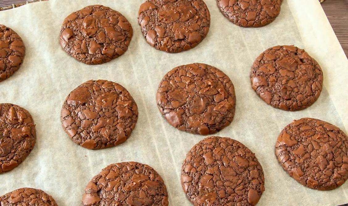 Keto triple chocolate cookies on a baking rack
