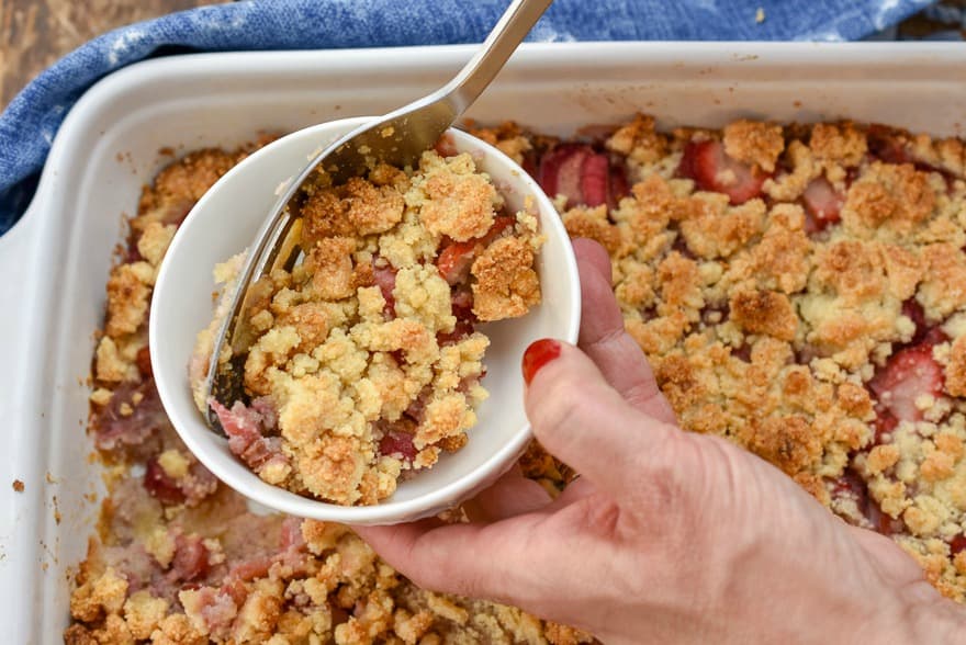 Keto Strawberry Rhubarb Cobbler being served