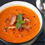 keto tomato bacon cheddar soup in a black and white bowl