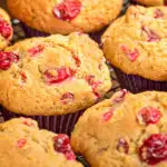 Keto cranberry muffins cooling on a baking rack