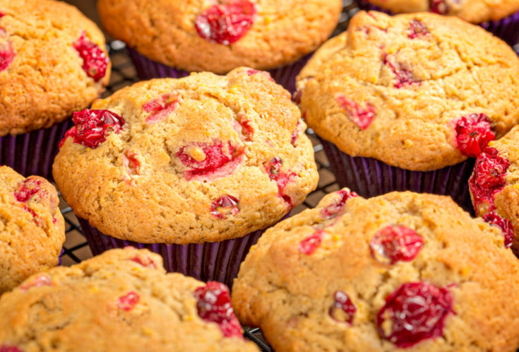 Keto cranberry muffins cooling on a baking rack