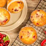 keto cranberry muffins cooling on a baking rack