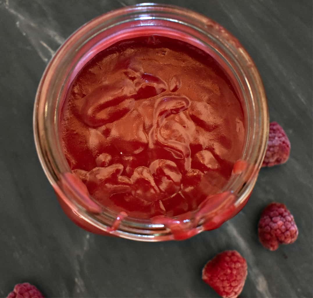 low carb raspberry curd in a mason jar