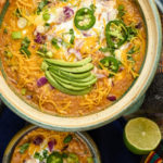 keto-friendly chicken chili easy served on a blue aztec tablecloth