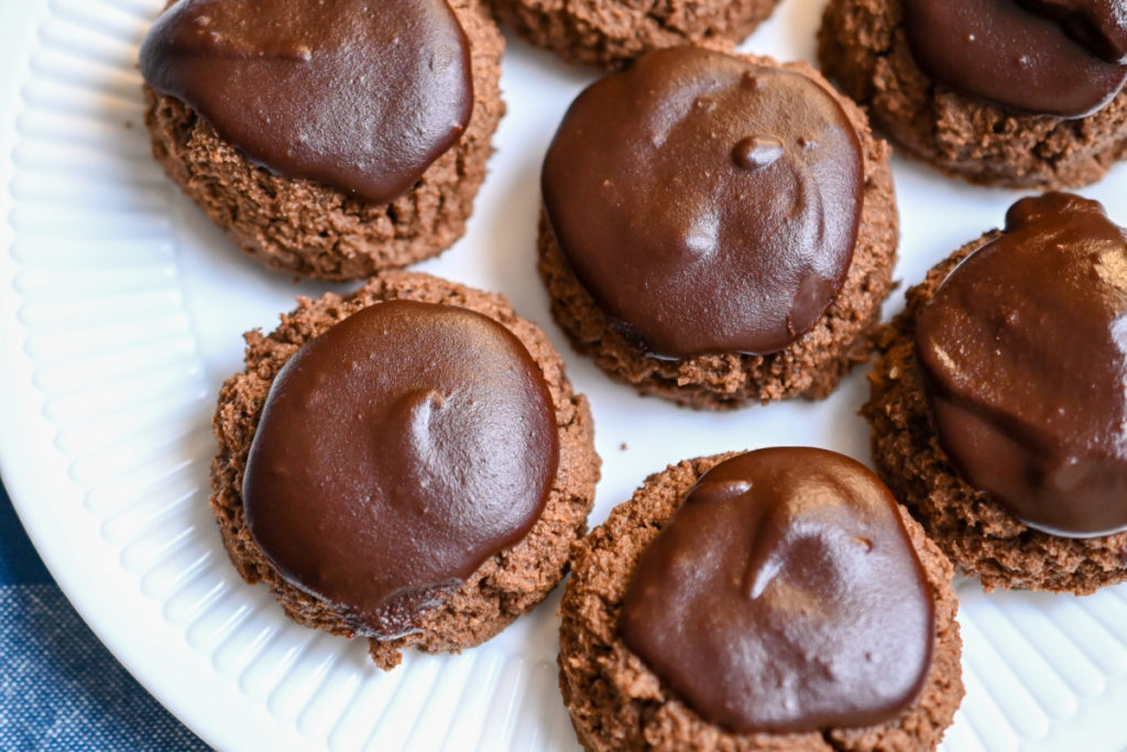 keto-friendly chocolate cookies on a white plate