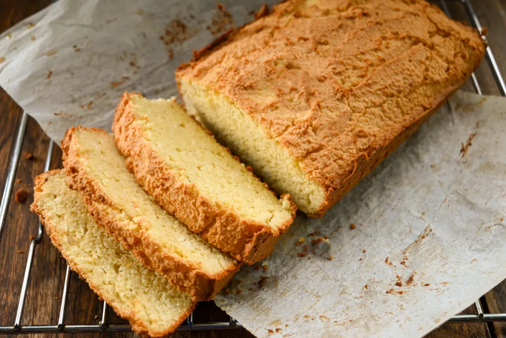 keto coconut flour pound cake cooling on a baking rack