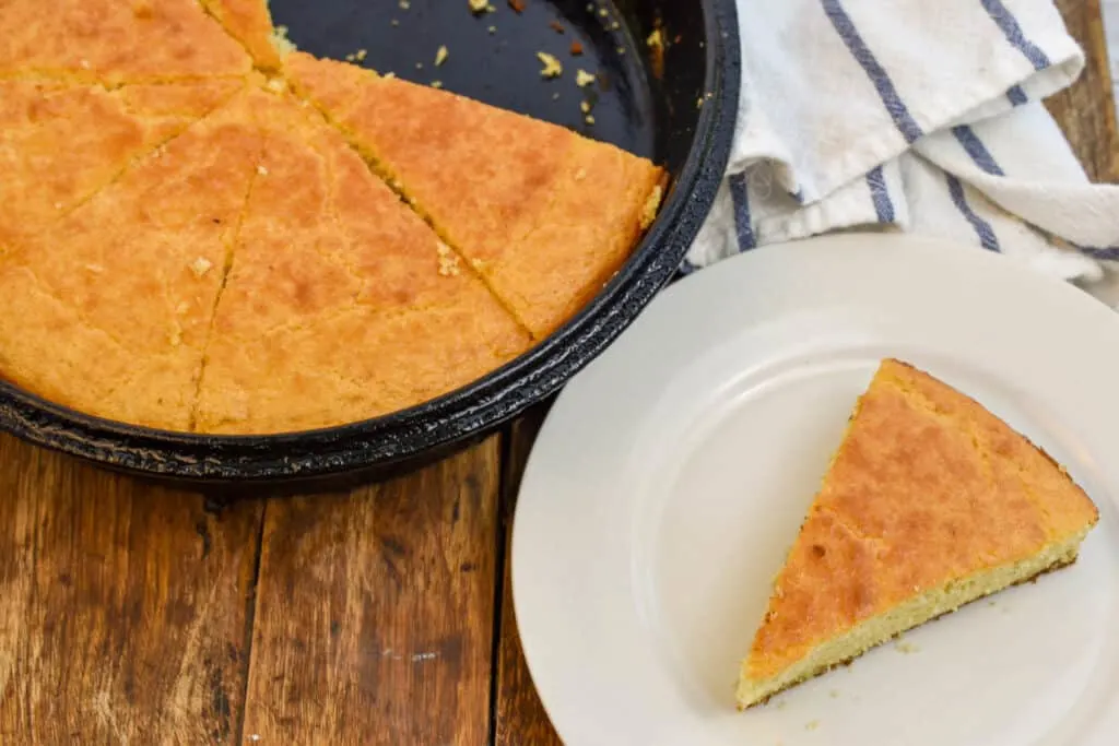 keto coconut flour cornbread sliced and ready to serve