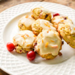 Keto friendly cranberry orange cookies on a small white plate