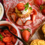 Keto strawberry shortcake served on a clear pink plate
