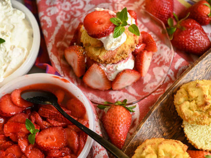 Keto strawberry shortcake served on a clear pink plate