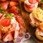 keto strawberry shortcake cupcakes served on a wooden board