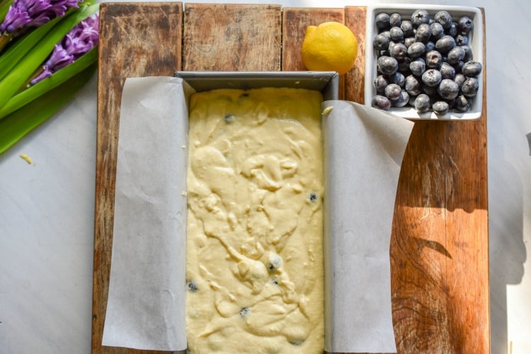 keto blueberry lemon bread batter in a loaf pan