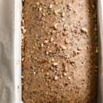 keto high fiber bread loaf cooling on a baking rack