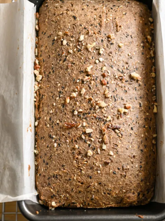 keto high fiber bread loaf cooling on a baking rack