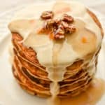 Keto Carrot Pancakes- The ultimate carrot cake pancakes that just so happen to also be sugar-free, grain-free, gluten-free and have an option to also be nut-free. If you're a fan of all the flavors of carrot cake but want to avoid the carbs, this recipe is for you. #ketocarrotpancakes #ketopancakes #lowcarbpancakes #lowcarbcarrotcakepancakes