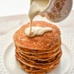 Keto Carrot Pancakes- The ultimate carrot cake pancakes that just so happen to also be sugar-free, grain-free, gluten-free and have an option to also be nut-free. If you're a fan of all the flavors of carrot cake but want to avoid the carbs, this recipe is for you. #ketocarrotpancakes #ketopancakes #lowcarbpancakes #lowcarbcarrotcakepancakes