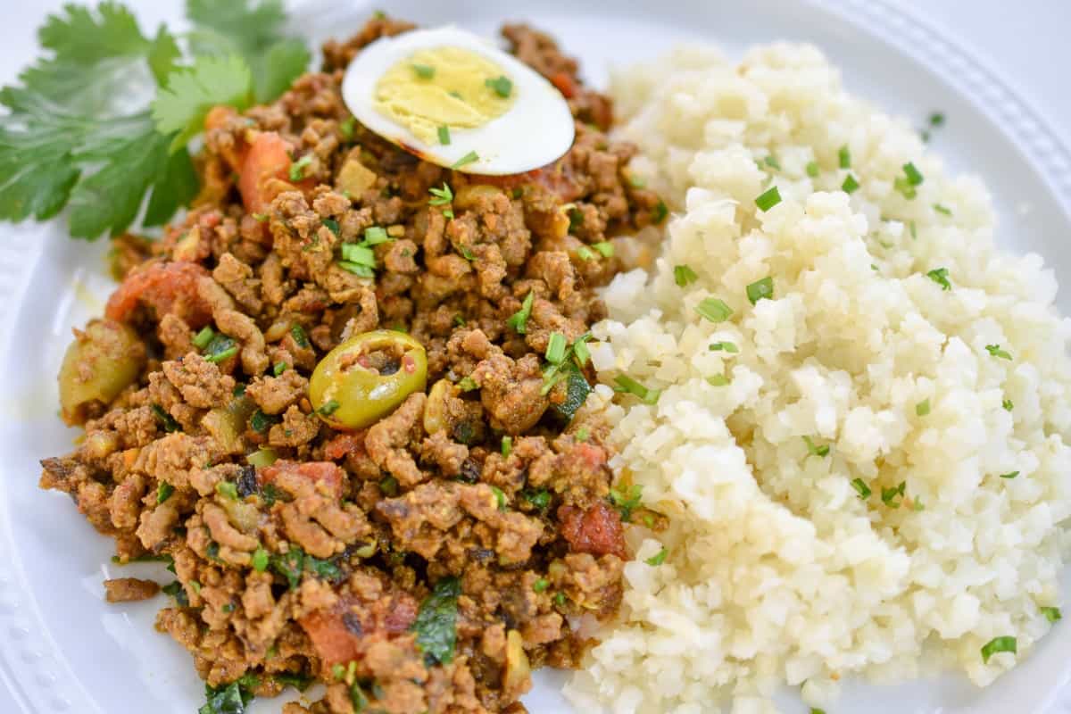 Keto Moroccan picadillo is a simple dish that gets its flavor by cooking ground beef with the exotic flavors of Morocco. The warm spices as well as Harissa paste is the basis of this very flavorful dish.