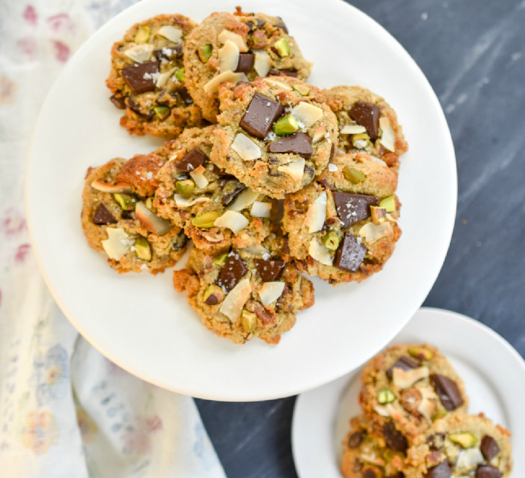 Keto trash cookies on a stand and a small white plate