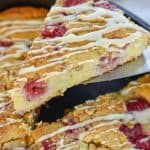 Keto Raspberry Scones-makes the perfect low carb treat. They have all the flavor we love in traditional raspberry scones minus all the carbs. Plus, it's easy because you do not roll out the dough in this recipe. #ketoscones #lowcarbscones #ketoraspberryscones #lowcarbraspberryscones 