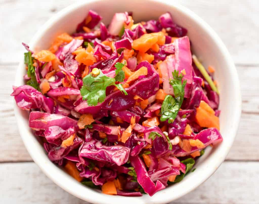 keto red cabbage slaw served in a small white bowl
