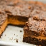 These rich Keto pumpkin cheesecake brownies are perfect for when you have a hankering for both chocolate and pumpkin and can't decide between the two. The fact that they are low in carbs, sugar-free, gluten and grain-free makes them a great treat for anyone doing a ketogenic diet. 
