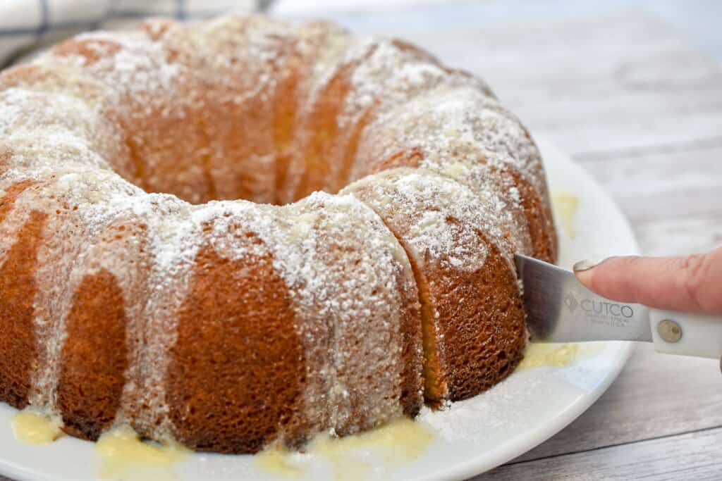 keto brown butter cake being sliced