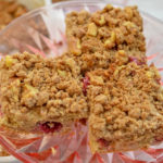 three pieces of keto cranberry coffee cake on a cake plate_