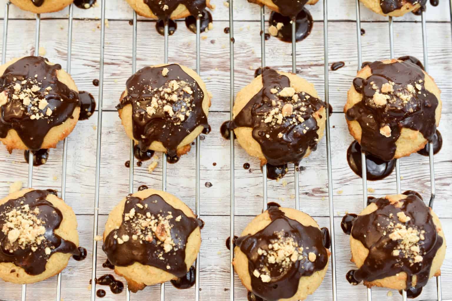 keto peanut butter chocolate cookies on a on a baking cooling rack